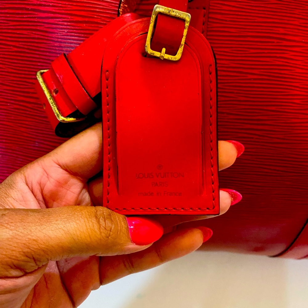 Louis Vuitton duffle bag epi leather red